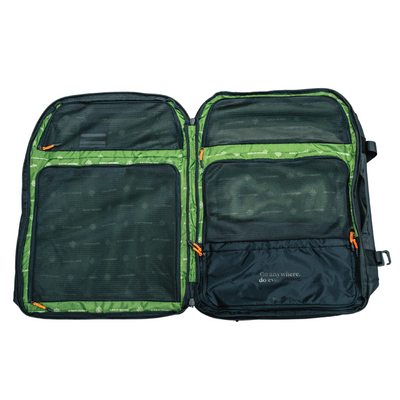 The inside of the trash free trail bag with a green finish and multiple pockets for storage.